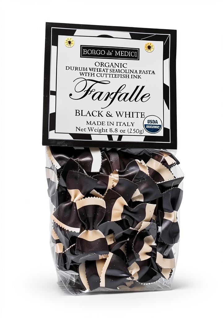 Bow tie pasta displayed in a ceramic bowl with fresh herbs